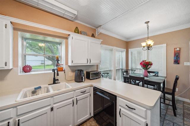 kitchen featuring white cabinets, a sink, light countertops, black dishwasher, and a peninsula