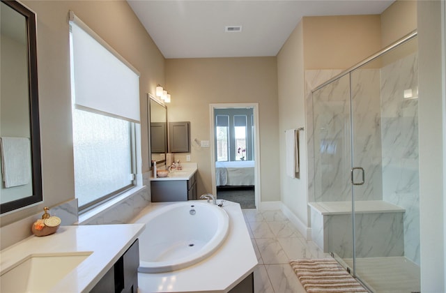 full bath with a marble finish shower, plenty of natural light, visible vents, and marble finish floor