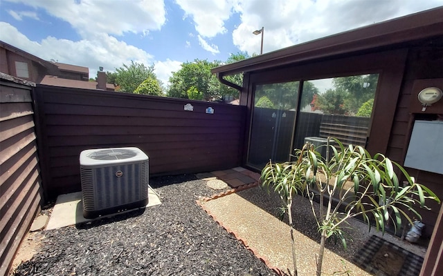 2611 Grants Lake Blvd Unit 228, Sugar Land, TX 77479 - fenced backyard featuring central AC unit
