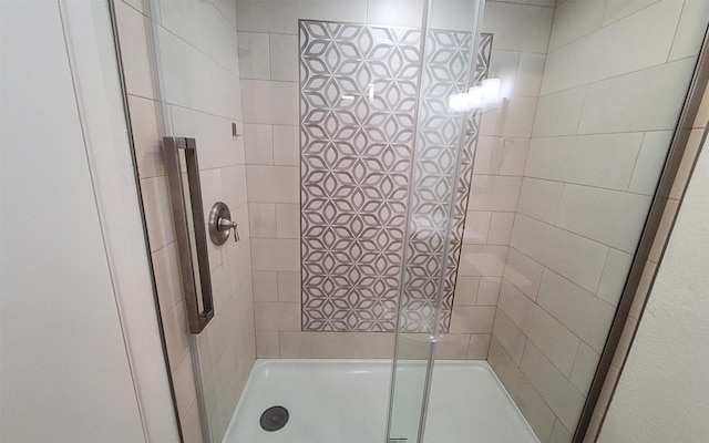 2611 Grants Lake Blvd Unit 228, Sugar Land, TX 77479 - bathroom with a tile shower