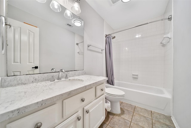 bathroom with shower / bath combo, vanity, toilet, tile patterned floors, and visible vents