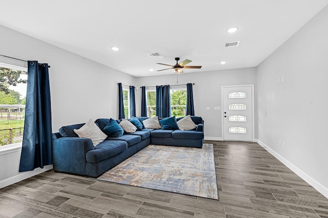 3409 2nd Ave N, Texas City, TX 77590 - living room featuring visible vents, a ceiling fan, and plenty of natural light