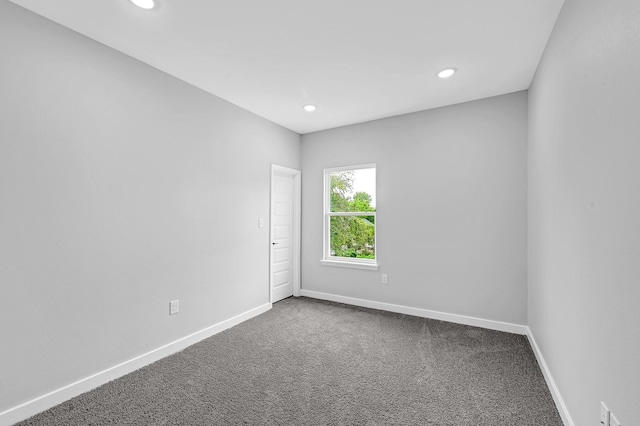 3409 2nd Ave N, Texas City, TX 77590 - unfurnished room featuring recessed lighting, baseboards, and dark carpet