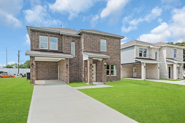 3409 2nd Ave N, Texas City, TX 77590 - traditional-style house with central AC unit, a front yard, and brick siding