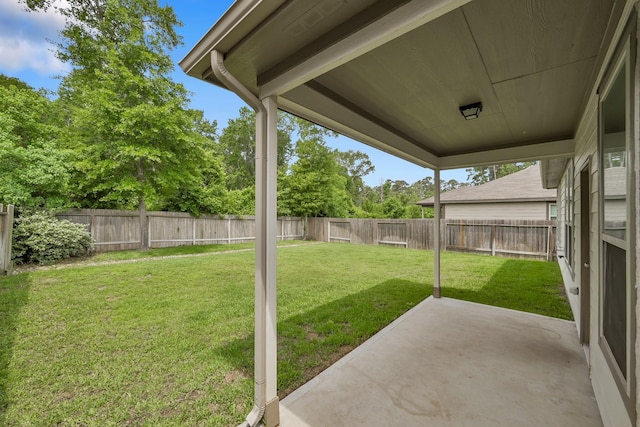 4202 Amber Ruse Dr, Conroe, TX 77304 - view of yard featuring a patio and a fenced backyard
