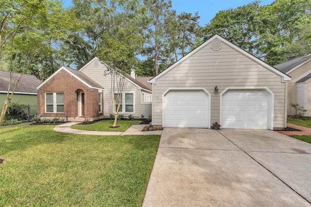 91 Bitterwood Cir, The Woodlands, TX 77381 - ranch-style house featuring a garage, concrete driveway, a front lawn, and brick siding