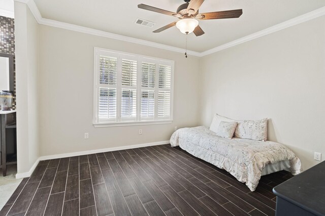 28710 Sapphire Cir, Magnolia, TX 77355 - bedroom with wood finished floors, crown molding, baseboards, and a ceiling fan