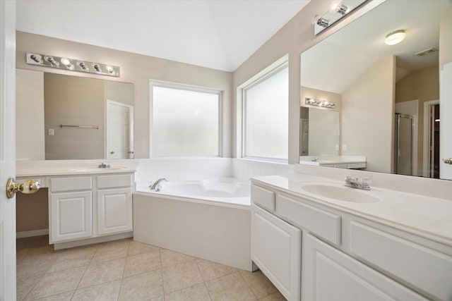 2411 Lacyberry St, Houston, TX 77080 - bathroom featuring lofted ceiling, two vanities, a bath, tile patterned flooring, and a shower with door