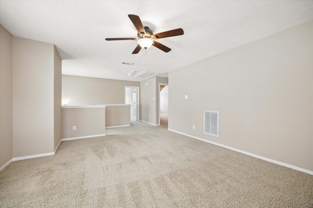 2411 Lacyberry St, Houston, TX 77080 - spare room with ceiling fan, attic access, carpet floors, and baseboards