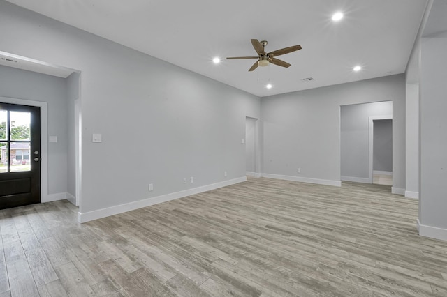 12390 Green Ridge Dr, Willis, TX 77318 - interior space featuring light wood-style floors, baseboards, ceiling fan, and recessed lighting