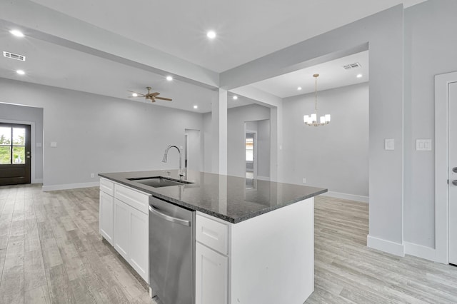 12390 Green Ridge Dr, Willis, TX 77318 - kitchen with visible vents, dishwasher, a sink, baseboards, and recessed lighting
