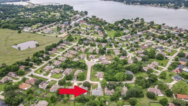 12390 Green Ridge Dr, Willis, TX 77318 - birds eye view of property featuring a water view and a residential view