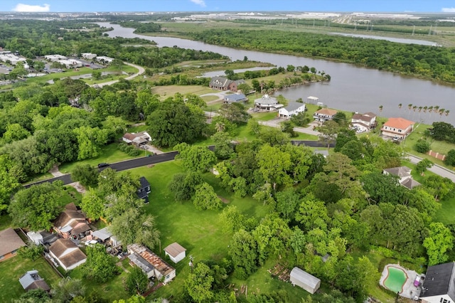 drone / aerial view featuring a water view and a residential view