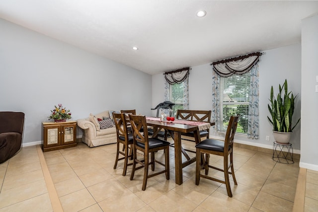 dining room featuring recessed lighting, baseboards, and light tile patterned floors