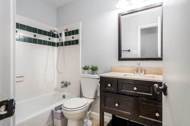 full bath with toilet, baseboards, shower / tub combination, and vanity