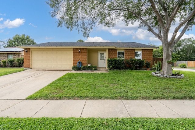 single story home with fence, a front lawn, brick siding, a garage, and concrete driveway