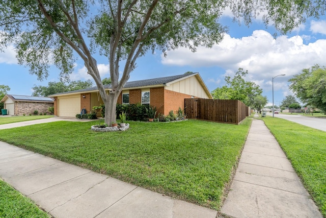 single story home with a front yard, a garage, brick siding, fence, and concrete driveway