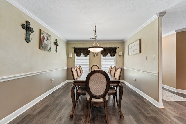 dining room featuring crown molding, baseboards, dark wood finished floors, and a textured ceiling