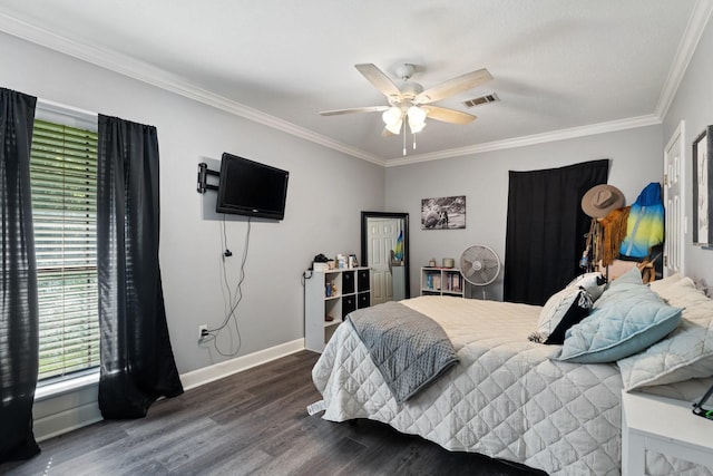 bedroom with baseboards, visible vents, dark wood-style floors, and ornamental molding