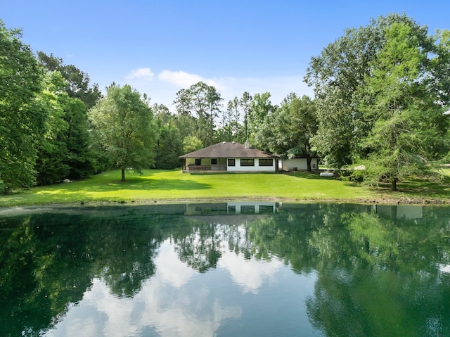 view of water feature featuring a wooded view