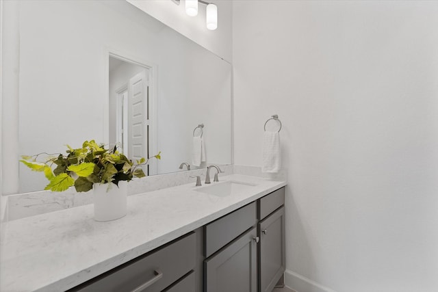 15631 Audubon Park Dr, Magnolia, TX 77354 - bathroom featuring vanity and baseboards