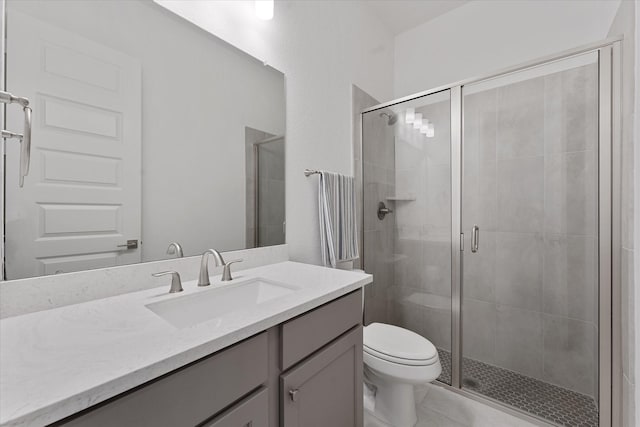15631 Audubon Park Dr, Magnolia, TX 77354 - bathroom featuring vanity, toilet, a shower stall, and tile patterned floors