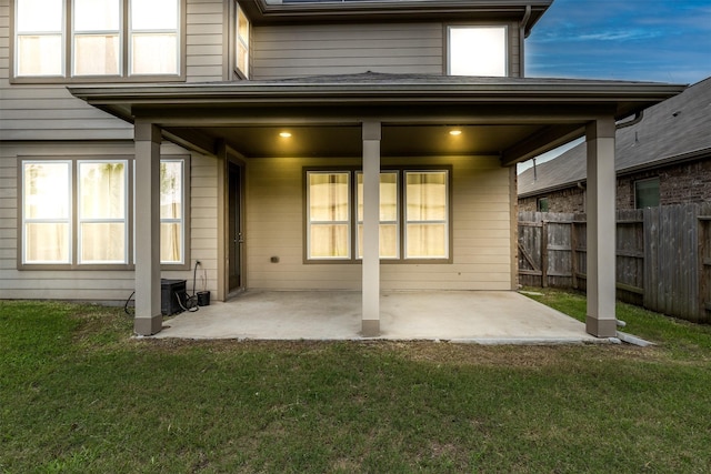 rear view of property featuring a patio