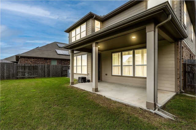 rear view of house with a patio