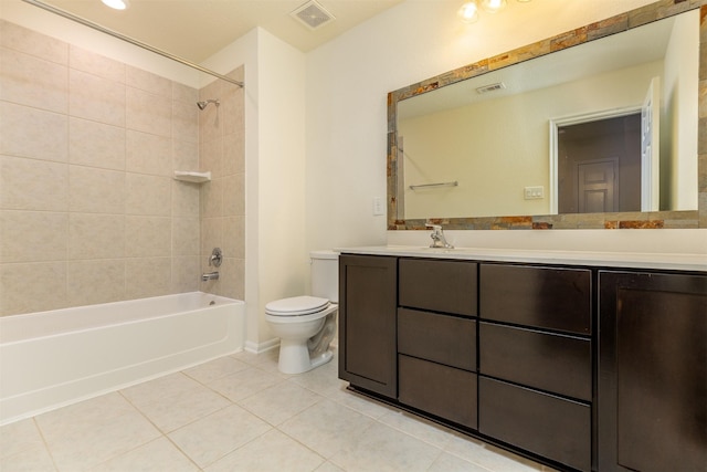 bathroom with toilet, tile patterned floors, bathing tub / shower combination, and vanity