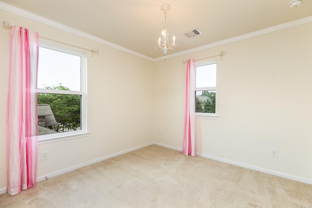 carpeted spare room with a chandelier, baseboards, and crown molding