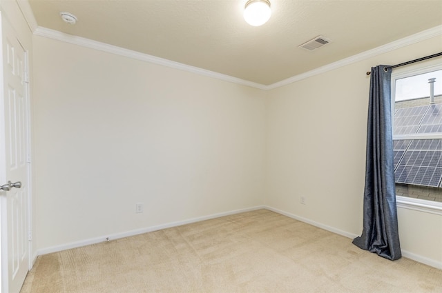 unfurnished room featuring light carpet, baseboards, ornamental molding, and a smoke detector