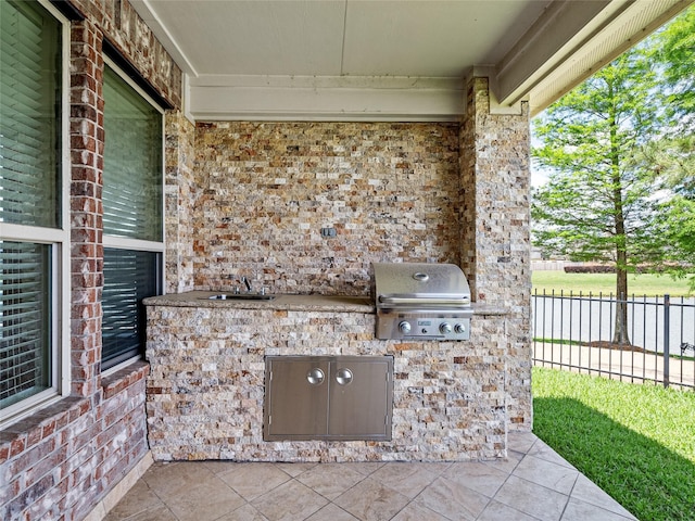 2513 Crestmoon Ct, Houston, TX 77089 - view of patio / terrace with an outdoor kitchen, fence, a sink, and grilling area