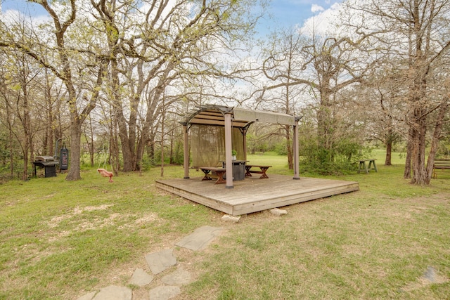 view of yard with a wooden deck