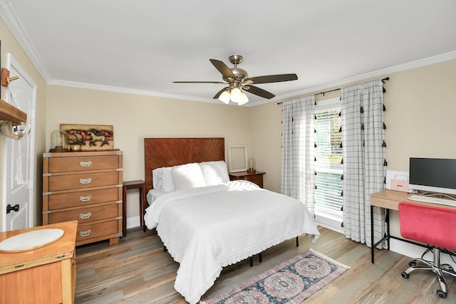 23058 Mills Rd, Porter, TX 77365 - bedroom with crown molding, ceiling fan, and light wood-style floors