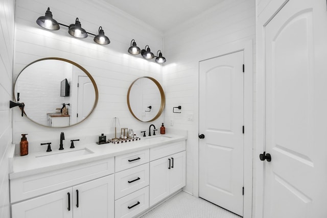 23058 Mills Rd, Porter, TX 77365 - full bath with a sink, tile patterned floors, crown molding, and double vanity
