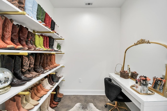 23058 Mills Rd, Porter, TX 77365 - home office with baseboards, concrete floors, and visible vents