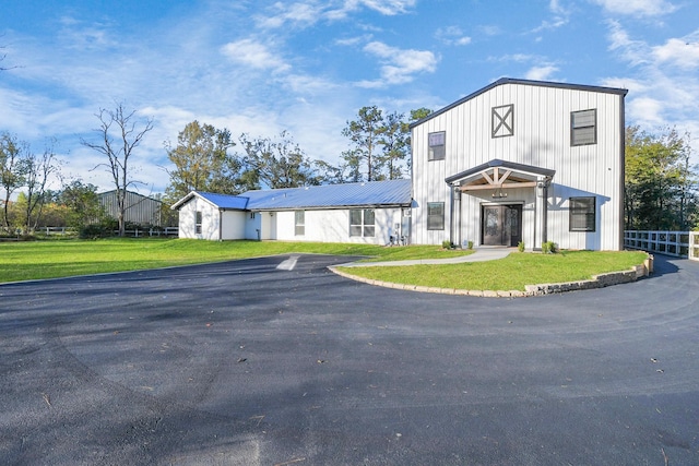 23058 Mills Rd, Porter, TX 77365 - view of building exterior featuring fence and driveway