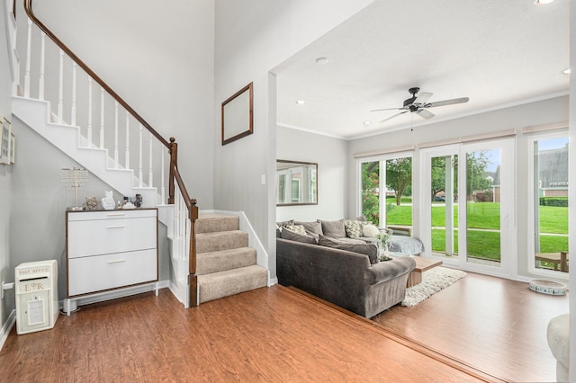 2722 Masters Dr, League City, TX 77573 - living area with baseboards, ceiling fan, and wood finished floors