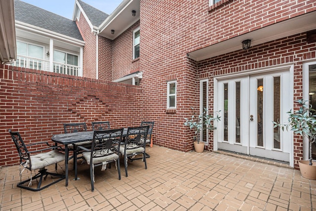 2722 Masters Dr, League City, TX 77573 - view of patio / terrace with french doors and outdoor dining area