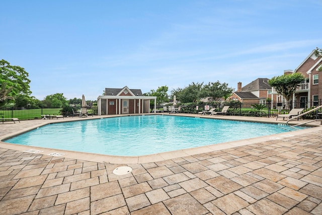 2722 Masters Dr, League City, TX 77573 - community pool featuring a patio area and fence