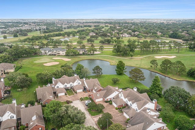 2722 Masters Dr, League City, TX 77573 - drone / aerial view featuring a residential view, view of golf course, and a water view