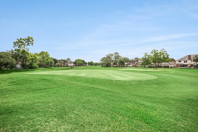 2722 Masters Dr, League City, TX 77573 - surrounding community with golf course view and a yard