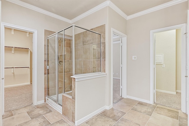 2524 Garnetfield Ln, Friendswood, TX 77546 - full bath with a stall shower, crown molding, a walk in closet, and baseboards