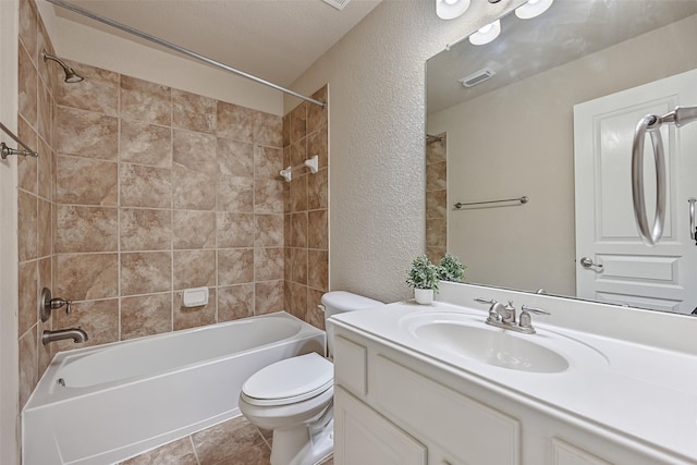 2524 Garnetfield Ln, Friendswood, TX 77546 - full bath with a textured wall, toilet, shower / washtub combination, and vanity