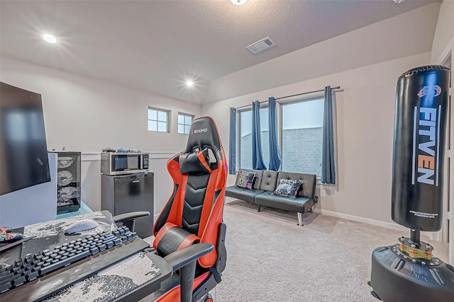 interior space featuring baseboards, carpet, recessed lighting, and visible vents