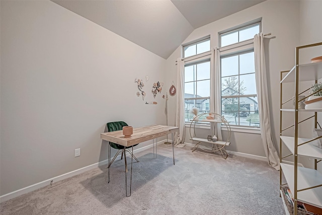 office area with baseboards, carpet, and lofted ceiling