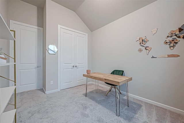 office featuring baseboards, carpet flooring, and vaulted ceiling