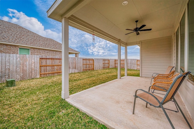 view of patio featuring a ceiling fan and a fenced backyard