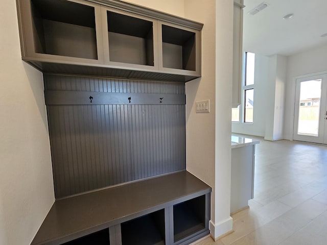mudroom featuring baseboards and visible vents