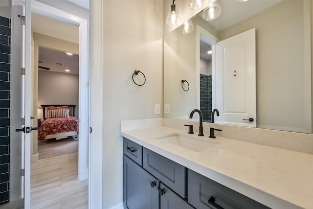 ensuite bathroom with vanity, visible vents, ensuite bathroom, a shower with shower curtain, and recessed lighting